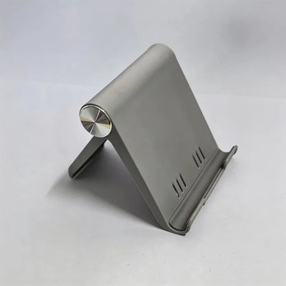 Soporte ajustable para teléfono, portátil y plegable.