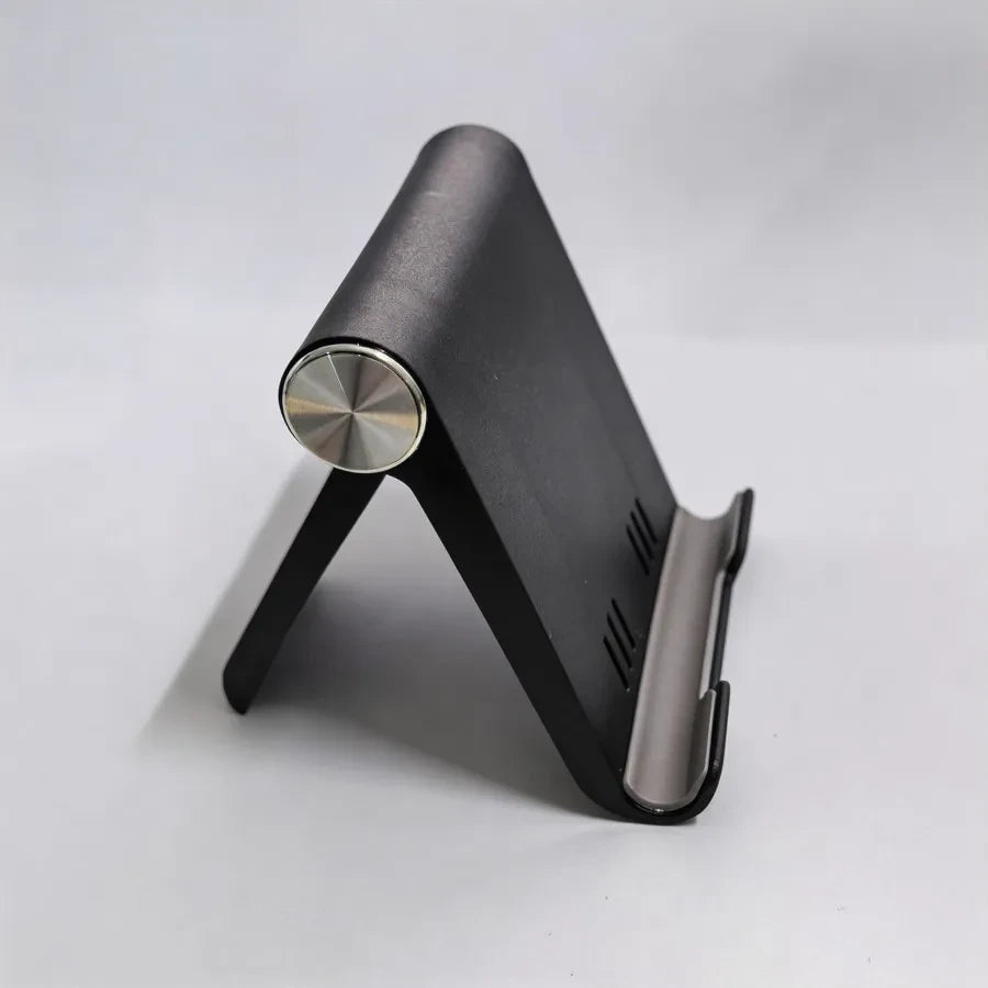 Soporte ajustable para teléfono, portátil y plegable.