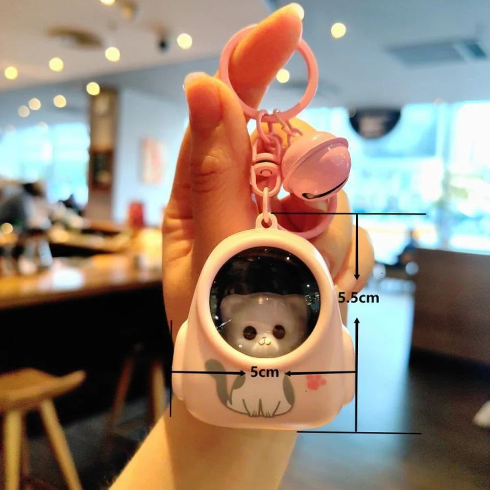 Llaveros para mochilas escolares con forma de gato astronauta, luz nocturna brillante de ZAKOL.