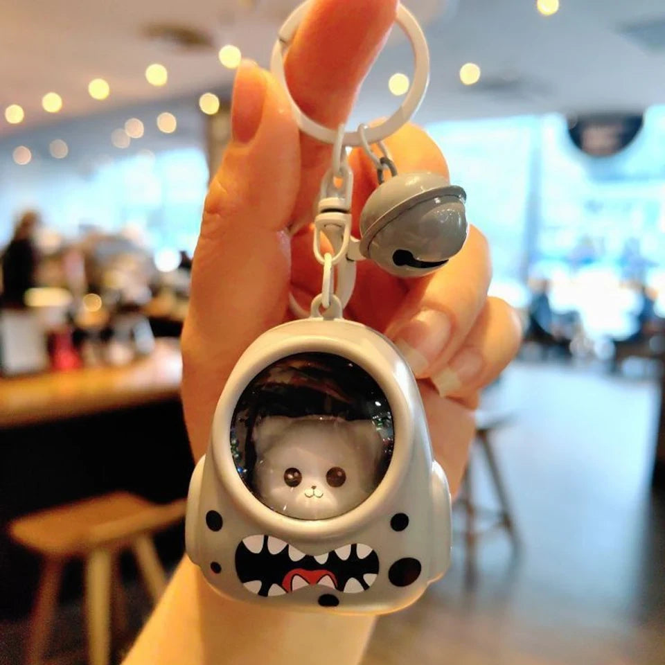 Llaveros para mochilas escolares con forma de gato astronauta, luz nocturna brillante de ZAKOL.