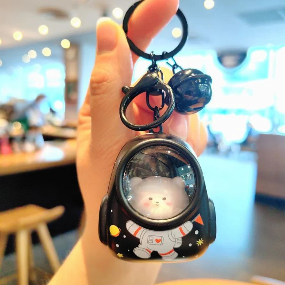 Llaveros para mochilas escolares con forma de gato astronauta, luz nocturna brillante de ZAKOL.